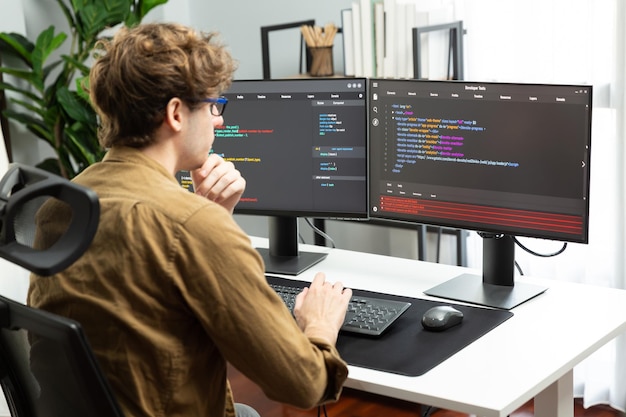 It developer with stressful overworked in creating online software code gusher