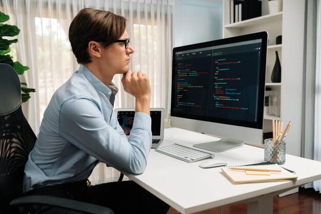 IT looking at online software development on pc align working laptop Pecuniary