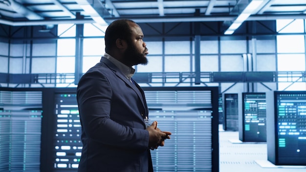 IT specialist doing evaluation of data center workspace