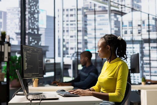IT worker coding in programming languages to construct algorithms