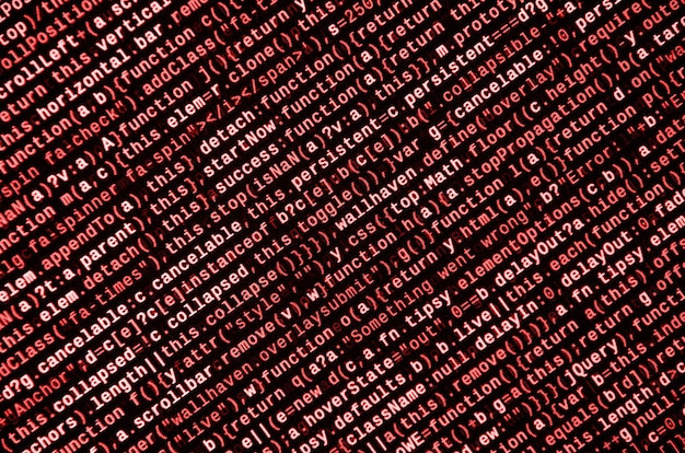 JavaScript code in text editor. Coding cyberspace concept. Screen of web developing code
