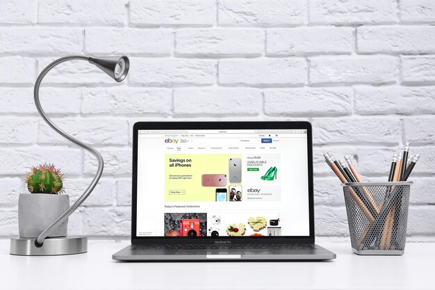KYIV UKRAINE OCTOBER 26 2017 Apple MacBook Pro with eBay homepage on screen eBay is multinational ecommerce corporation