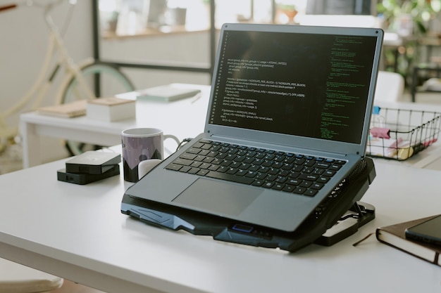 Laptop with Cooling Pad on Table