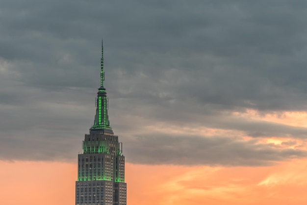 low angle view of tower against cloudy sky