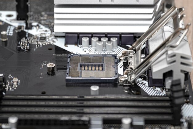 Macro shot of empty modern lga 1200 socket for cpu on black desktop motherboard