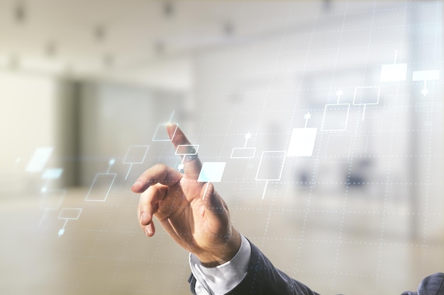 man hand working with abstract virtual financial graph on blurred office background forex and investment concept multiexposure