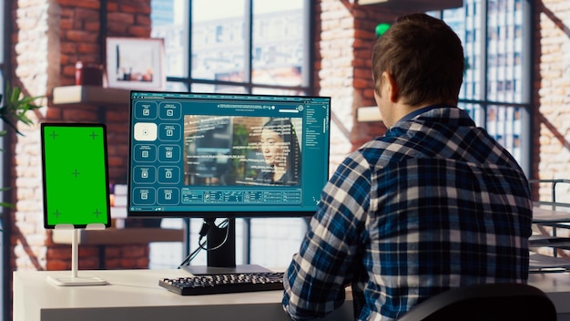 Man looking at tutorial on mockup tablet to learn how to use text to video AI