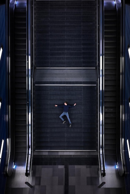 Man lying down on steps