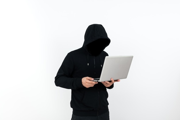 man standing with laptop presenting cyber security businessman thinking deeply for information technology defence guy brain storming brilliant strategies