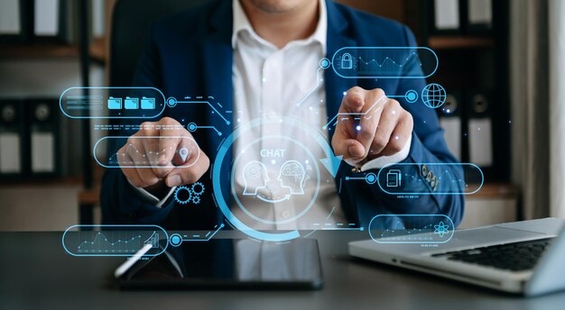 Man using chatbot in computer and tablet smart intelligence AiChat with AI Artificial Intelligence developed by OpenAI generate Futuristic technology robot in online system