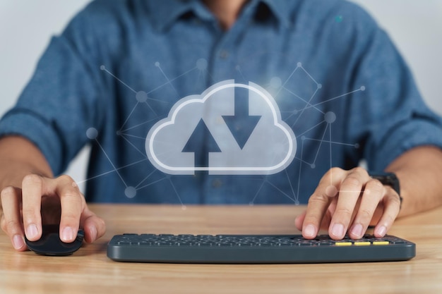 Man using computer with virtual cloud computing with connection line Cloud computing system