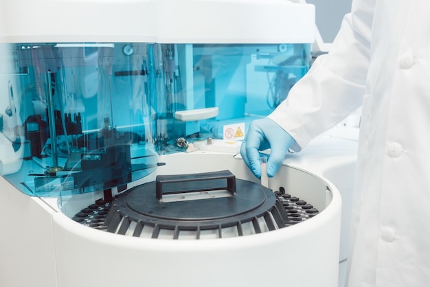 midsection of man working in laboratory