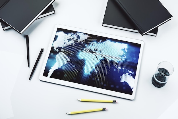 Modern digital tablet display with abstract creative world map research and analytics concept Top view 3D Rendering