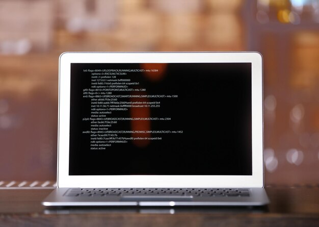 Modern laptop in cafe