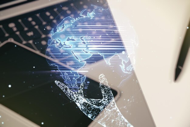 Multi exposure of abstract creative digital world map on modern laptop background tourism and traveling concept