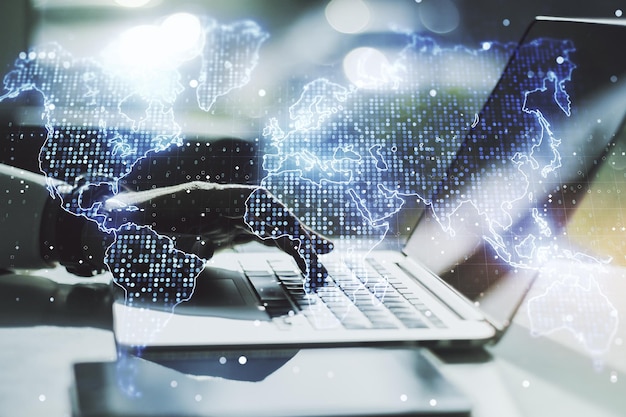Multi exposure of abstract graphic world map and hands typing on computer keyboard on background big data and networking concept