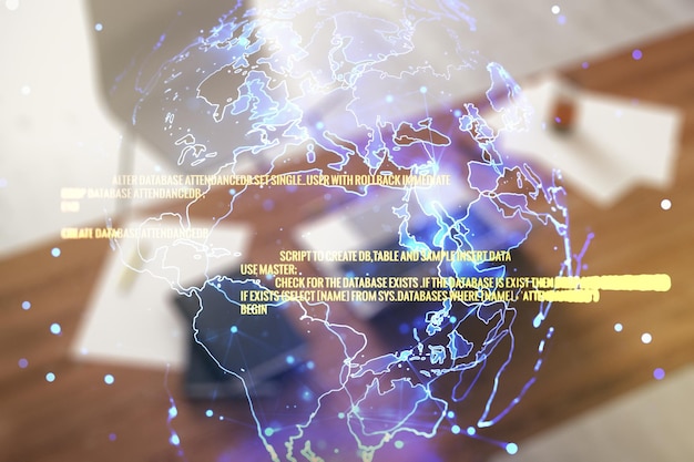 multi exposure of abstract software development hologram with world map and modern desktop with laptop on background global research and analytics concept