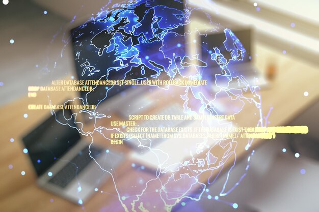 multi exposure of abstract software development hologram with world map and modern desktop with laptop on background global research and analytics concept