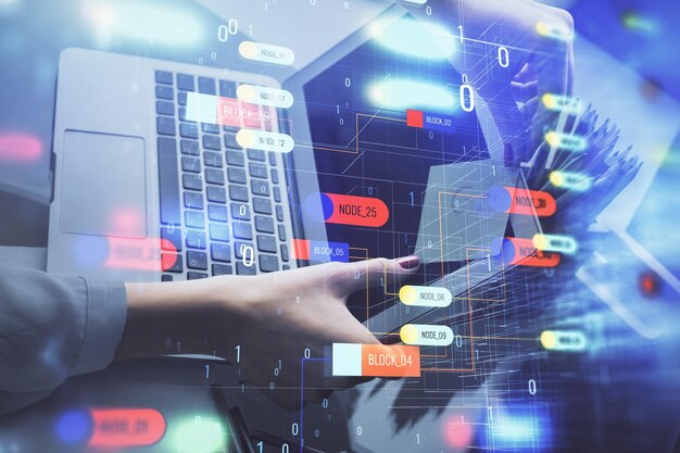 multi exposure of woman hands working on computer and data theme hologram drawing tech concept