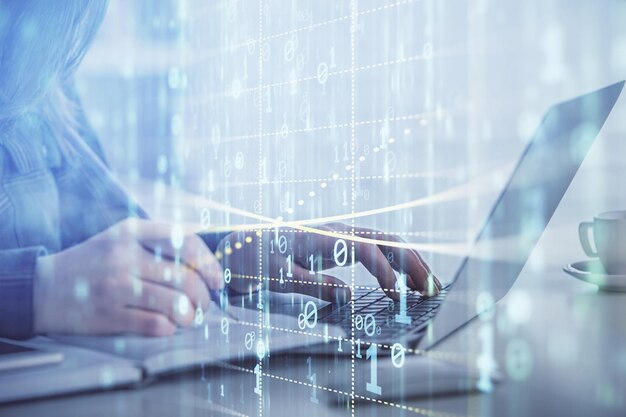 multi exposure of woman hands working on computer and data theme hologram drawing tech concept