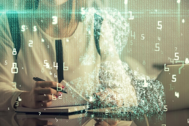Multi exposure of woman hands working on computer and data theme hologram drawing Tech concept