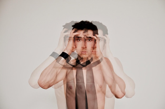 multiple image of serious man over white background
