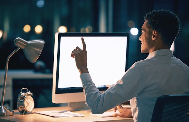 night computer screen and man with mockup space for digital interaction product placement or website design business man or professional person on desktop pc in mock up for press or point at app