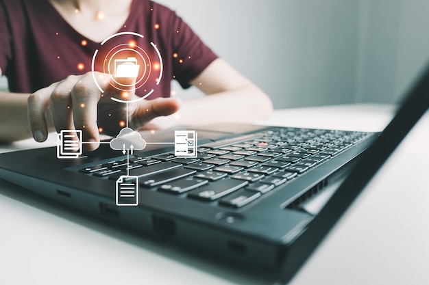 officer using laptop manage files document management system dms online document database management automated processes to manage system erp enterprise efficient business technology
