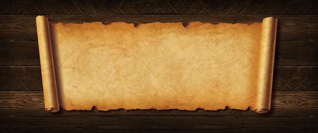 Old paper horizontal banner Parchment scroll on a wood board background