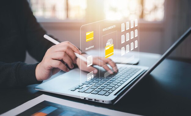 online documentation database and document management system concept businessman using a tablet or computer document management system and automation software to archiving and efficiently manage