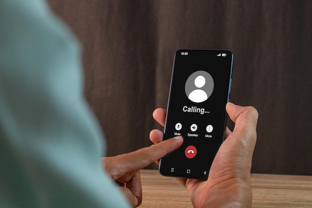 outgoing call calling concept man holding a mobile phone to call someone with a voice call