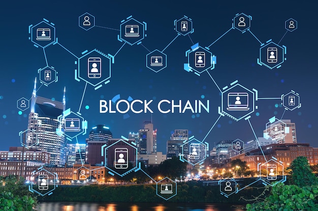 Panoramic view of Broadway district of Nashville over Cumberland River at illuminated night skyline Tennessee USA Decentralized economy Blockchain cryptocurrency cryptography concept hologram