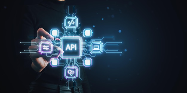 person interacting with holographic api interface icons on a dark neon blue background representing modern technology concept