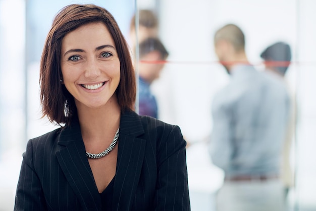 portrait business and woman in office smile and employee with confidence pride and legal aid face person and professional with startup career ambition and attorney with happiness and lawyer