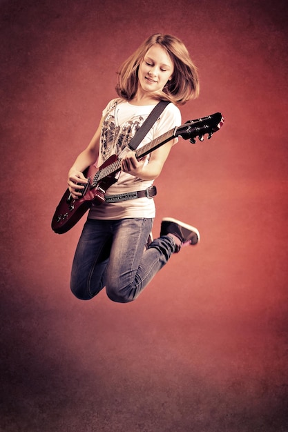 portrait of a teenage girl jumping