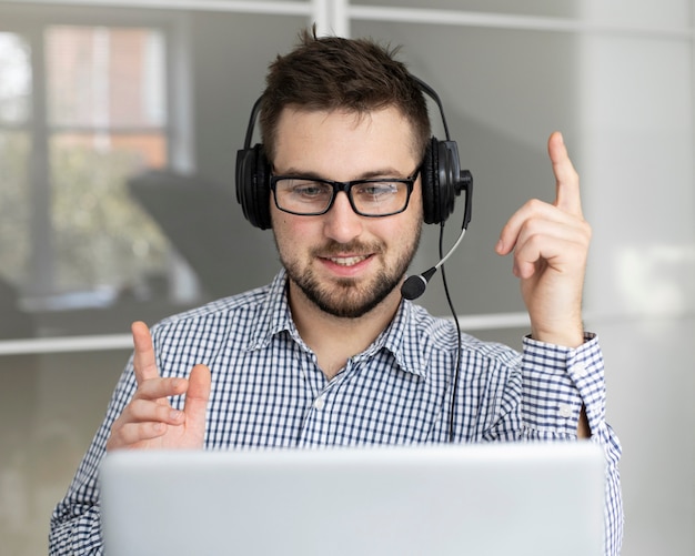 Portrait of employee with headset on