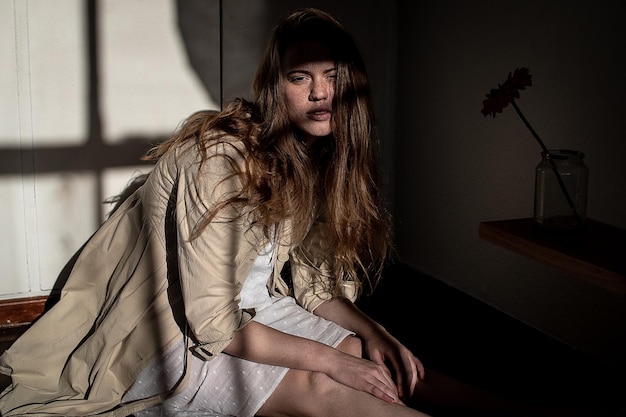 portrait of woman sitting at home