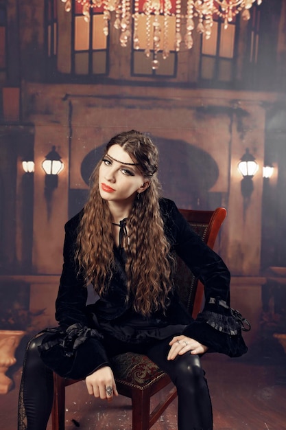 portrait of woman sitting at night