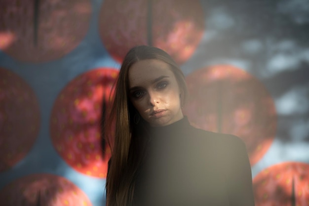portrait of young woman looking away at night