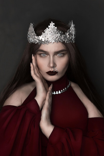 portrait of young woman wearing crow