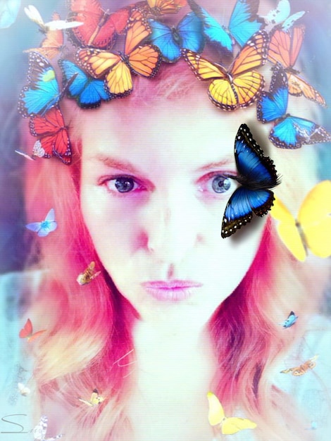 portrait of young woman with flowers in hair