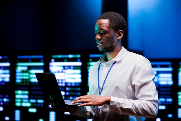 Precise electrician inspecting server rigs providing vast computing resources and storage. Professional data center enabling AI to process massive datasets for training and inference
