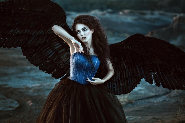 pretty girl-demon with black wings behind her back