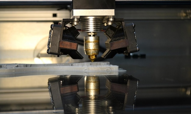 Printer printing gray objects on mirror reflective surface closeup
