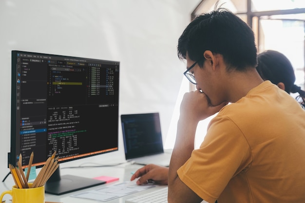 Programmer and UX UI designer working in a software development and coding technologies. Mobile and website design and programing development technology.
