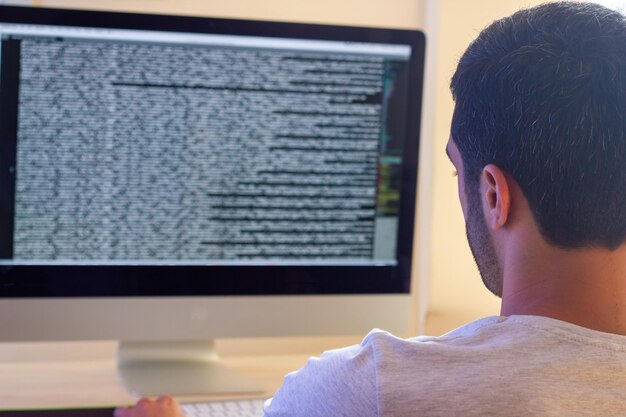 programmer coding with computer programmer at the work