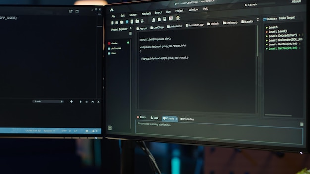 Programmer typing on computer to fix software vulnerabilities close up