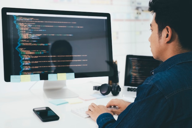Programmers and developer teams are coding and developing software