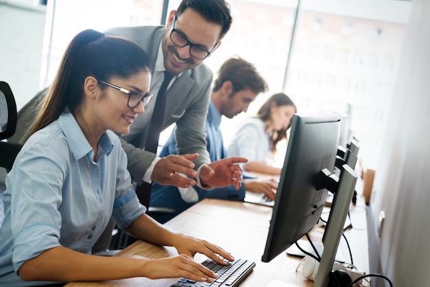 programmers working in a software developing company office