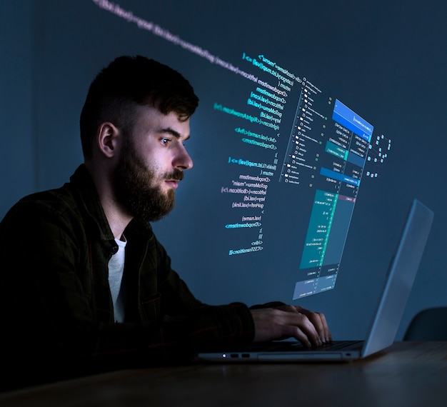 Programming background with person working with codes on computer